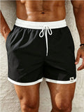 Short de bain homme blanc et noir